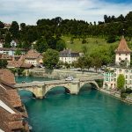 silver-vehicle-on-concrete-arch-bridge-1291766