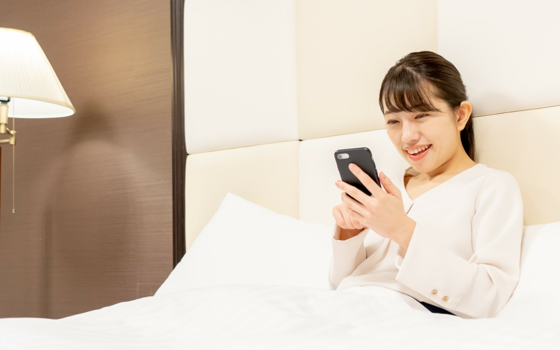 Woman in room enjoying wifi