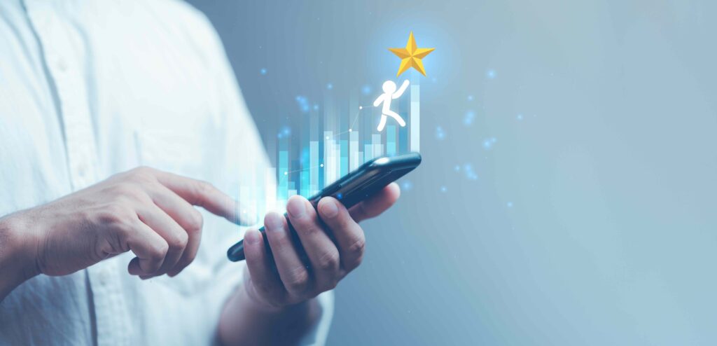 Man holding a smart phone tilted to the upper right hand corner and with rising bars and a person reaching for a star, representing an increasing customer journey