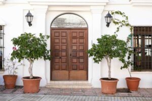 Small boutique luxury hotel front door entrance in a European style city block